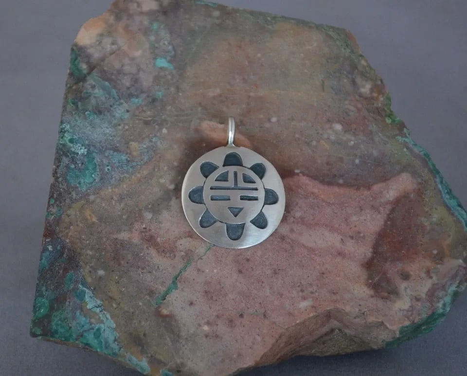 MANUEL HOYUNGOWA (1953-2011) - HOPI STERLING SILVER ROUND PENDANT - SUN - 1.25" (1 of 2)