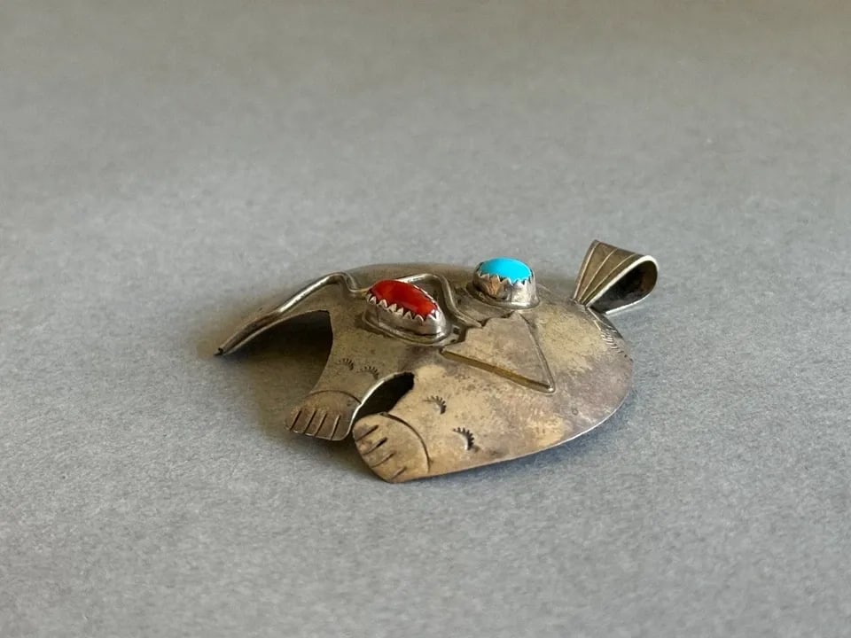 VINTAGE NAVAJO STERLING SILVER HEARTLINE BEAR PENDANT WITH TURQUOISE AND CORAL: VINTAGE NAVAJO STERLING SILVER HEARTLINE BEAR PENDANT WITH TURQUOISE AND CORAL Vintage Navajo Sterling Silver Heartline Bear Pendant with Turquoise and Coral 1 3/4" Tall x 1 7/8” Wide