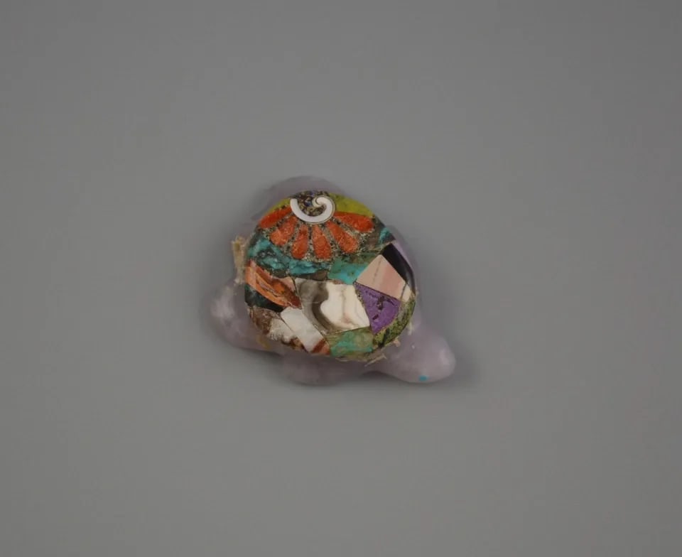 NAVAJO TURTLE FETISH - MOSAIC INLAY ON AMETHYST STONE- JOYCE QUAM: NAVAJO TURTLE FETISH - MOSAIC INLAY ON AMETHYST STONE- JOYCE QUAM Item Description: 2 1/2" Lenth x 2" Wide Multi Stone And shell Inlay
