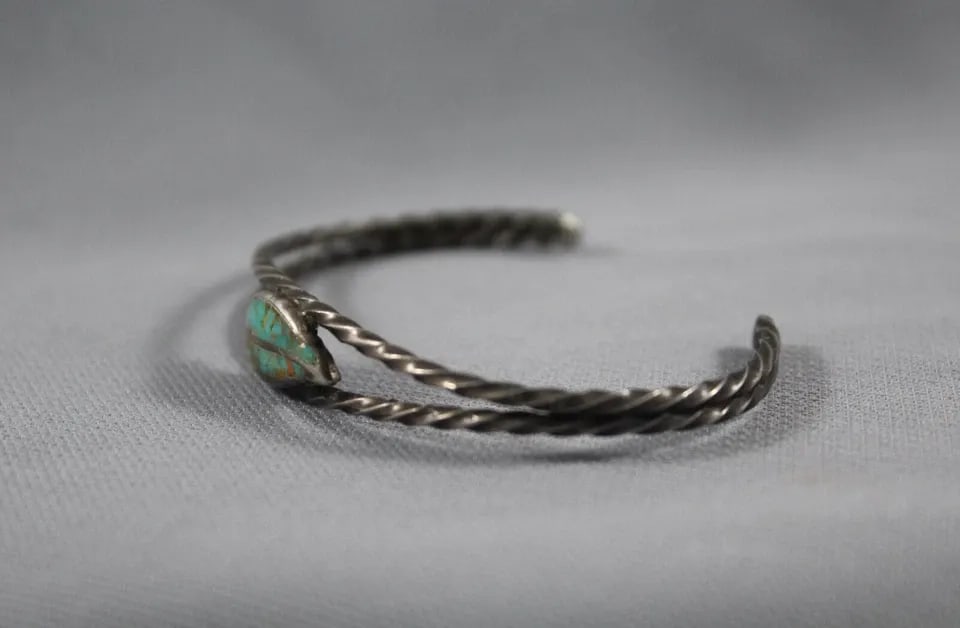 OLD PAWN ZUNI TURQUOISE AND STERLING SILVER LEAF BRACELET: OLD PAWN ZUNI TURQUOISE AND STERLING SILVER LEAF BRACELET Item Description: Great Old Pawn Zuni Leaf Bracelet 3/8 " Wide 4 7/8 Inside with a 1 1/4 Opening