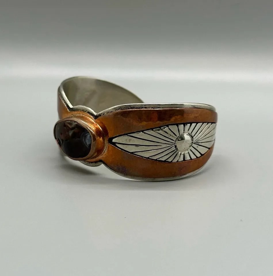 VINTAGE NAVAJO NICKLE SILVER AND COPPER BRACELET SIGNED FL: VINTAGE NAVAJO NICKLE SILVER AND COPPER BRACELET SIGNED FL Item Description: 1 1/8" Wide ..5 1/8" Inside and 1 1/2 " Opening * Nickle Silver * Looks like Fire Agate Stone ..