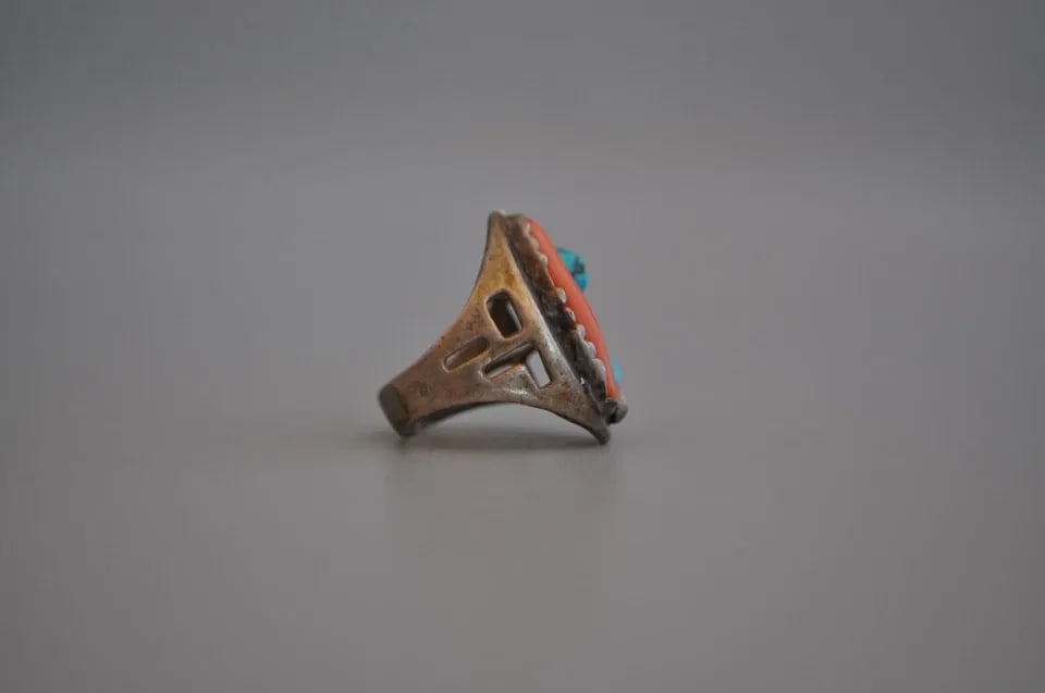 OLD PAWN NAVAJO STERLING SILVER RING - TURQUOISE CORAL SIZE 8 3/4: OLD PAWN NAVAJO STERLING SILVER RING - TURQUOISE CORAL SIZE 8 3/4 Weight 13.35 Grams 1 1/8 " Tall Old Pawn Jewelry dates from the early 1900s to the 1970s. Most of it is not signed because it wasn't t