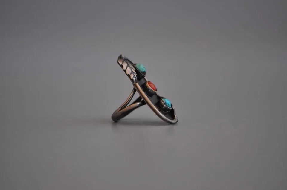 OLD PAWN NAVAJO STERLING SILVER RING - TURQUOISE, CORAL SIZE 5 1/4: OLD PAWN NAVAJO STERLING SILVER RING - TURQUOISE, CORAL SIZE 5 1/4 Weight 6.76 Grams 1 3/8" Tall Old Pawn Jewelry dates from the early 1900s to the 1970s. Most of it is not signed because it wasn't th