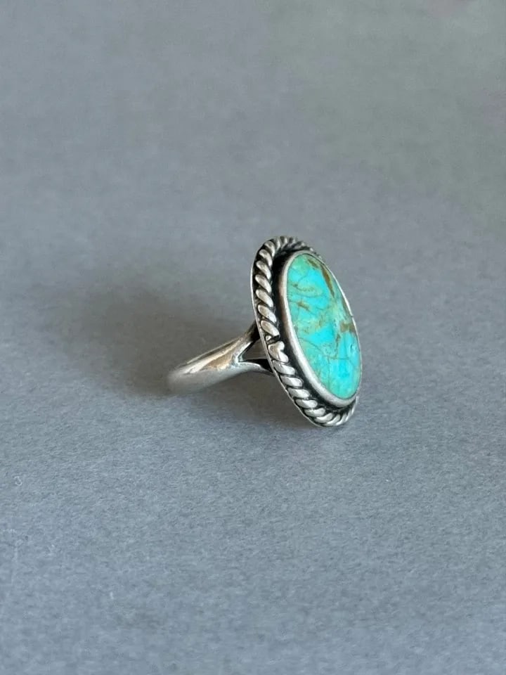 OLD PAWN NAVAJO STERLING SILVER AND TURQUOISE RING. SIZE 5 1/2: OLD PAWN NAVAJO STERLING SILVER AND TURQUOISE RING. SIZE 5 1/2 Old Pawn Navajo Sterling Silver and Turquoise Ring. Size 5 1/2 ..7/8" Tall Throughout the 40 years that I have been in business, I have p