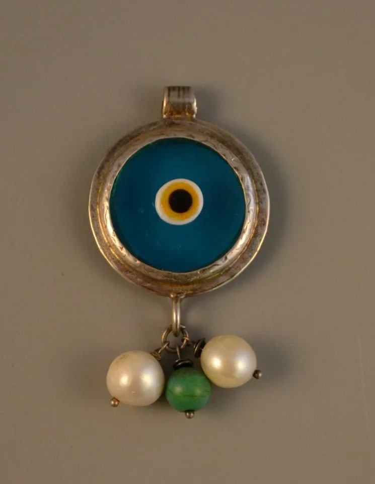 HANDCRAFTED STERLING TURQUOISE AMULET PENDANT PEARLS - EVIL EYE PROTECTION LUCK: HANDCRAFTED STERLING TURQUOISE AMULET PENDANT PEARLS - EVIL EYE PROTECTION LUCK Item Description: This amulet pendant has been handcrafted of sterling silver with turquoise glass at the center. The ye