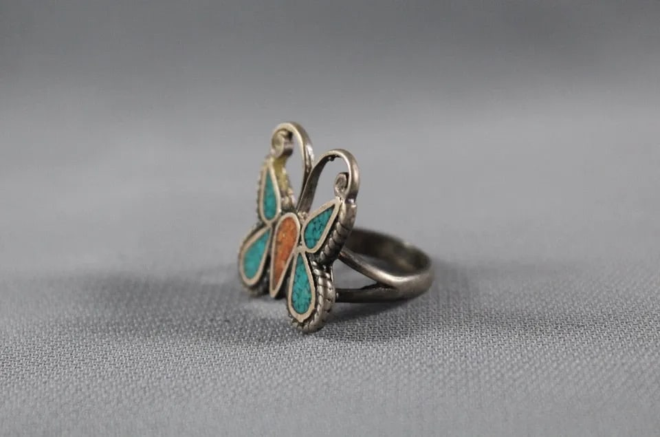 OLD PAWN NAVAJO TURQUOISE AND CORAL BUTTERFLY RING SIZE 5: OLD PAWN NAVAJO TURQUOISE AND CORAL BUTTERFLY RING SIZE 5 Item Description: 7/8” tall