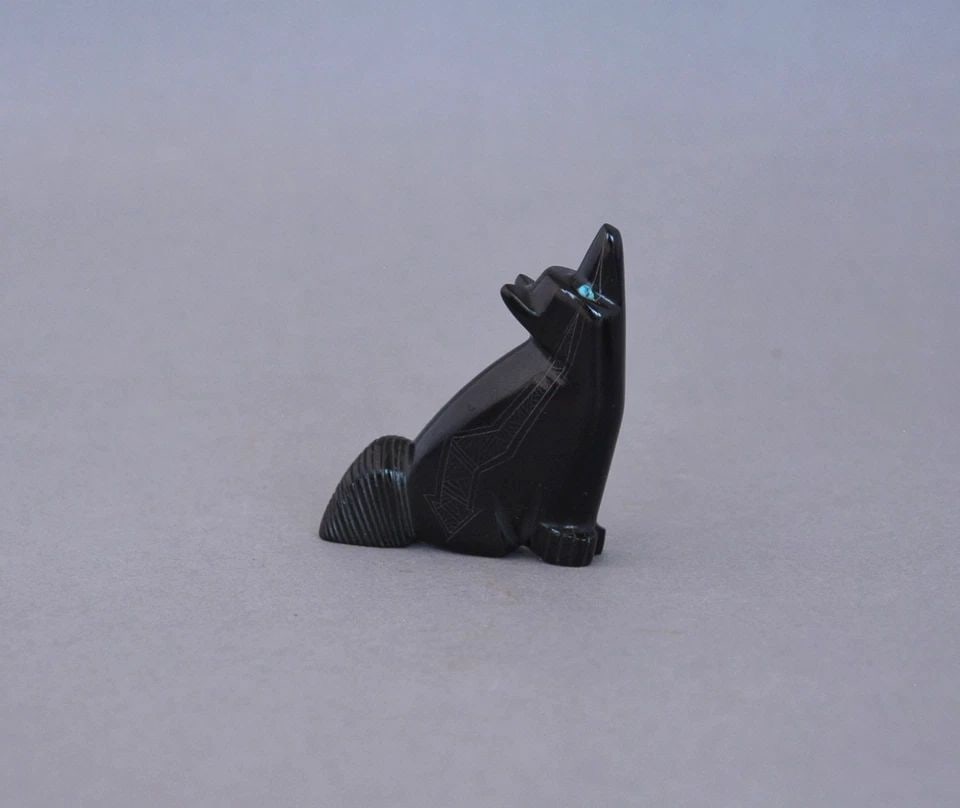 VINTAGE ZUNI FETISH CARVING - BLACK COYOTE INLAID TURQUOISE - HEARTLINE - SIGNED: VINTAGE ZUNI FETISH CARVING - BLACK COYOTE INLAID TURQUOISE - HEARTLINE - SIGNED This vintage fetish has been beautifully hand carved and signed by a Zuni artist. It stands 2 1/2" tall and is 1 3/4" l