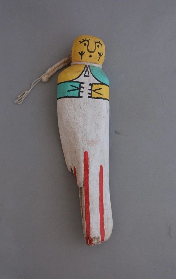 VINTAGE HOPI KACHINA - 9 3/4" TALL - THE QOQOTE STORYTELLER KACHINA: VINTAGE HOPI KACHINA - 9 3/4" TALL - THE QOQOTE STORYTELLER KACHINA Item Description: This is a vintage Qoqote or storyteller kachina. It is 9 3/4" tall. It is identified on the back as the Qoqote and