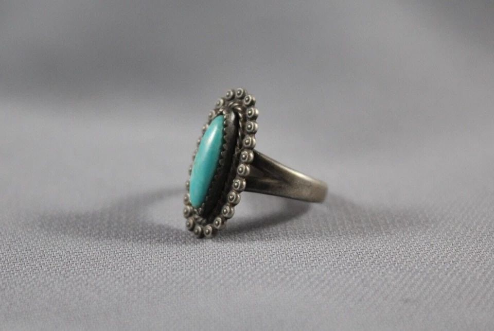 OLD PAWN NAVAJO STERLING AND TURQUOISE RING SIZE 8: OLD PAWN NAVAJO STERLING AND TURQUOISE RING SIZE 8 Item Description: 3/4” tall