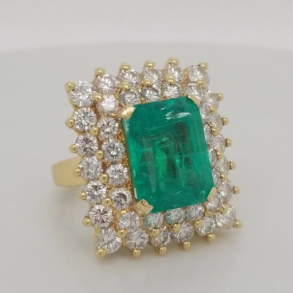 18K YELLOW GOLD ENGAGEMENT RING 14.58CT. NATURAL GREEN COLOMBIA EMERALD AGL CERT: 18K YELLOW GOLD ENGAGEMENT RING 14.58CT. NATURAL GREEN COLOMBIA EMERALD AGL CERT GORGEOUS 18K yellow gold emerald ring center GEM EMERALD COLOMBIA BERYL EMERALD weight 9.58ct. size 14x10.6mm AGL certi