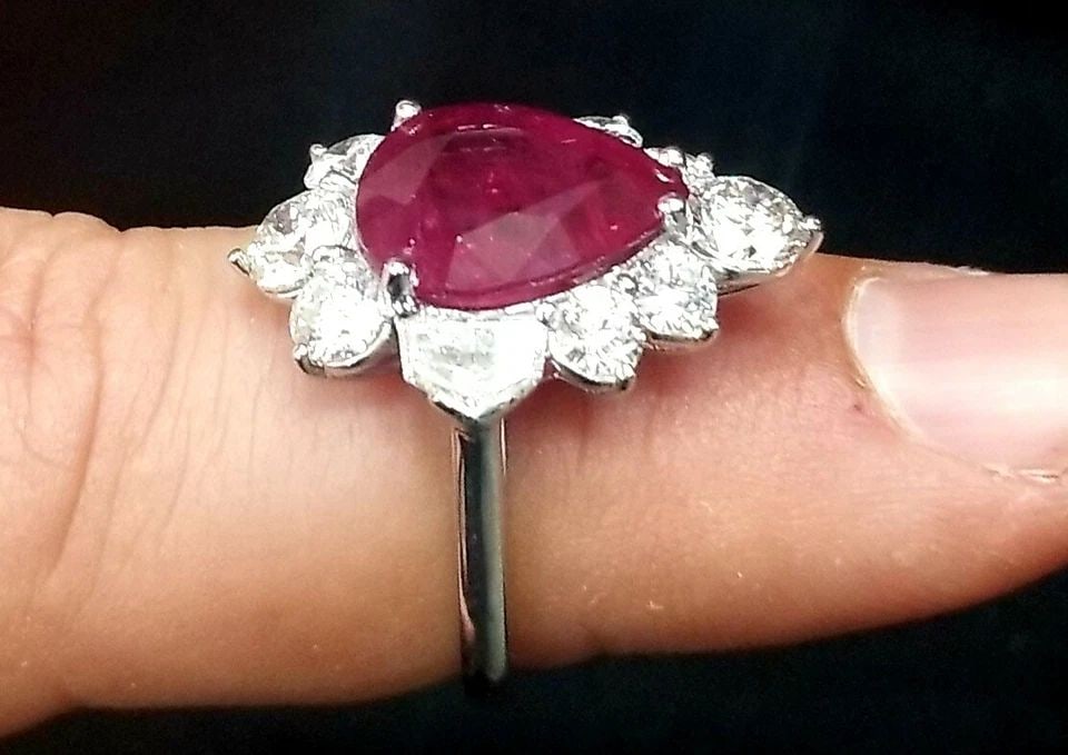 PLATINUM ENGAGEMENT RING 6.09CT. NATURAL GEM RUBY PEAR SHAPE GRS CERT: PLATINUM ENGAGEMENT RING 6.09CT. NATURAL GEM RUBY PEAR SHAPE GRS CERT Gorgeous ring crafted in platinum ring natural heated Pear shape ruby weight 6.09ct.GRS Cert.size 13x11This ruby is vivid red type