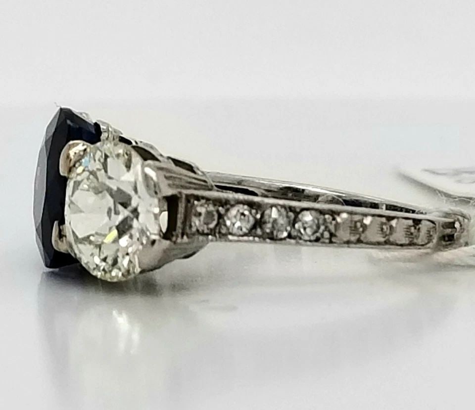 PLATINUM VINTAGE SAPPHIRE THREE STONE RING 5.06CT. NATURAL BLUE SAPPHIRE ROUND: PLATINUM VINTAGE SAPPHIRE THREE STONE RING 5.06CT. NATURAL BLUE SAPPHIRE ROUND Here is an outstanding platinum diamond engagement vintage ring,the beautiful three stone sapphire design gives this ring
