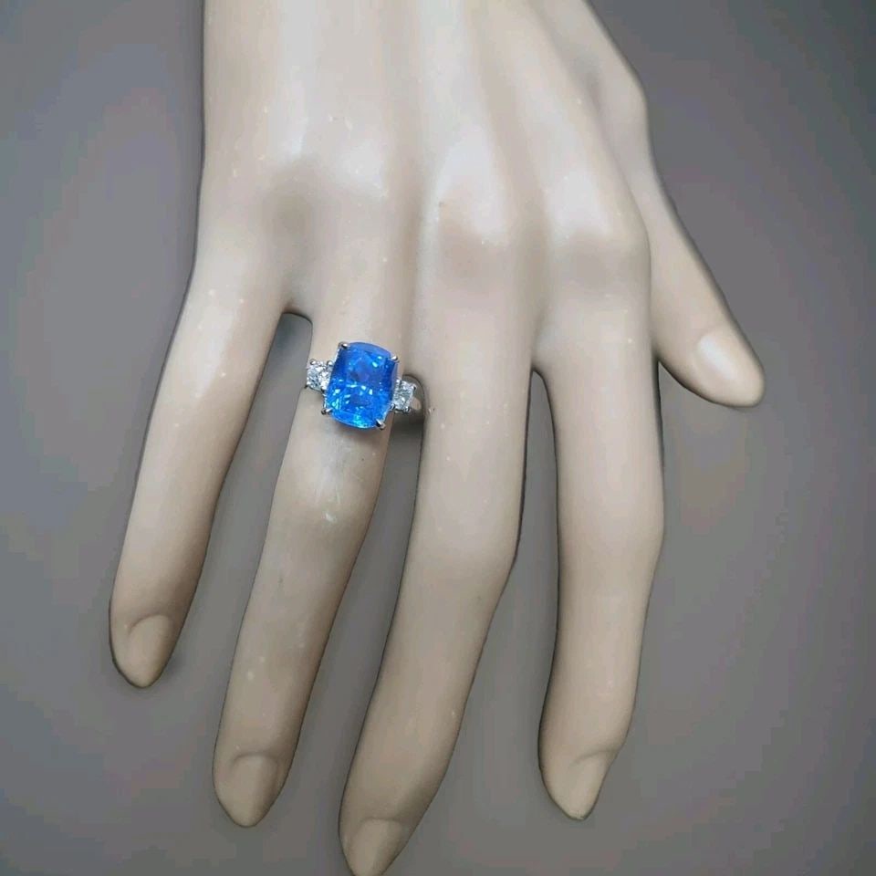 VINTAGE PLATINUM ENGAGEMENT RING 5.54CT. NATURAL CUSHION BLUE SAPPHIRE GIA CERT: VINTAGE PLATINUM ENGAGEMENT RING 5.54CT. NATURAL CUSHION BLUE SAPPHIRE GIA CERT Gorgeous Vintage platinum engagement Sapphire ring. center natural sapphire in cushion shape weight 5.54ct. Size 10.2x8.