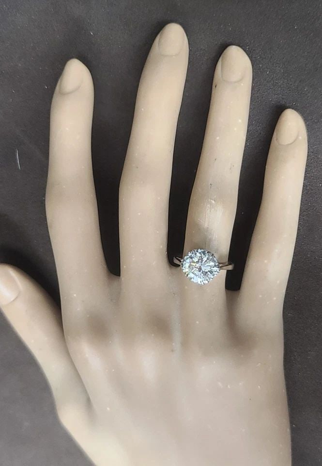 PLATINUM VINTAGE ENGAGEMENT RING 2.79CT. NATURAL ROUND DIAMOND CIRCA 1930'S: PLATINUM VINTAGE ENGAGEMENT RING 2.79CT. NATURAL ROUND DIAMOND CIRCA 1930'S Crafted in solid platinum, this exceptional Art Deco engagement ring dates back to the 1930s and embodies timeless antique e