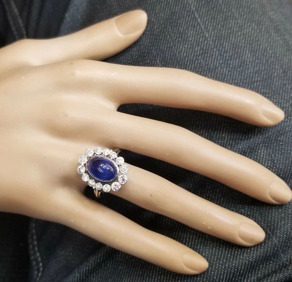 PLATINUM VINTAGE RING NATURAL UNTREATED BLUE CABOCHON SAPPHIRE 7.35CT GIA CERT: PLATINUM VINTAGE RING NATURAL UNTREATED BLUE CABOCHON SAPPHIRE 7.35CT GIA CERT Gorgeous Vintage natural blue sapphire SET platinum ring center natural blue sapphire untreated oval cabochon shape weigh