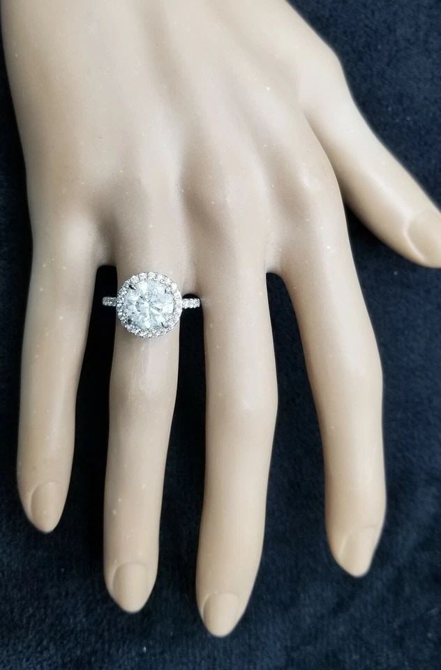 14K WHITE GOLD ENGAGEMENT RING 3.14CT NATURAL ROUND DIAMOND CLARITY ENHANCED: 14K WHITE GOLD 3.14CT NATURAL ROUND DIAMOND ENGAGEMENT RING GORGEOUS 14K white gold engagement ring center natural clarity enhanced diamond in round shape center weight 3.14ct. size 9.1 I1 QUALITY J c