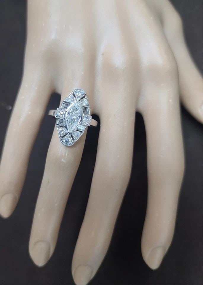 VINTAGE 14K WHITE GOLD ENGAGEMENT RING 2.72CT. NATURAL MARQUISE DIAMOND VS1-H: VINTAGE 14K WHITE GOLD ENGAGEMENT RING 2.72CT. NATURAL MARQUISE DIAMOND VS1-H Gorgeous Vintage marquise Diamond in 14k white gold ring, center marquise cut natural diamond weight 1.04ct VS1-H side set