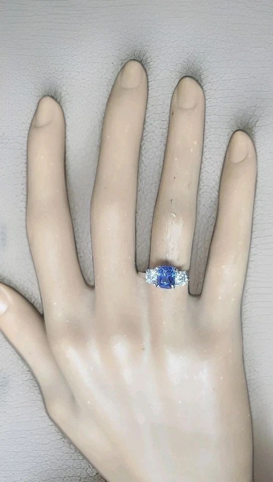 14K WHITE GOLD ENGAGEMENT RING 1.84CT.NATURAL BLUE SAPPHIRE CUSHION CUT GIA CERT: 14K WHITE GOLD ENGAGEMENT RING 1.84CT.NATURAL BLUE SAPPHIRE CUSHION CUT GIA CERT This 14K White Gold Engagement Ring features a stunning 1.84ct Natural Blue Sapphire in a Cushion Cut, accompanied by t