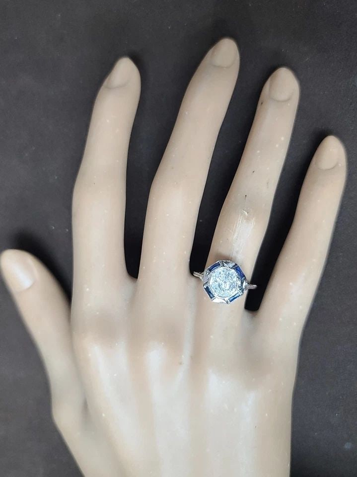 18K WHITE GOLD FILIGREE ENGAGEMENT RING 1.02CT.NATURAL OLD EURO OVAL DIAMOND: 18K WHITE GOLD FILIGREE ENGAGEMENT RING 1.02CT.NATURAL OLD EURO OVAL DIAMOND This stunning 18k white gold ring is the perfect symbol of your eternal love. The ring features a natural old Euro oval dia