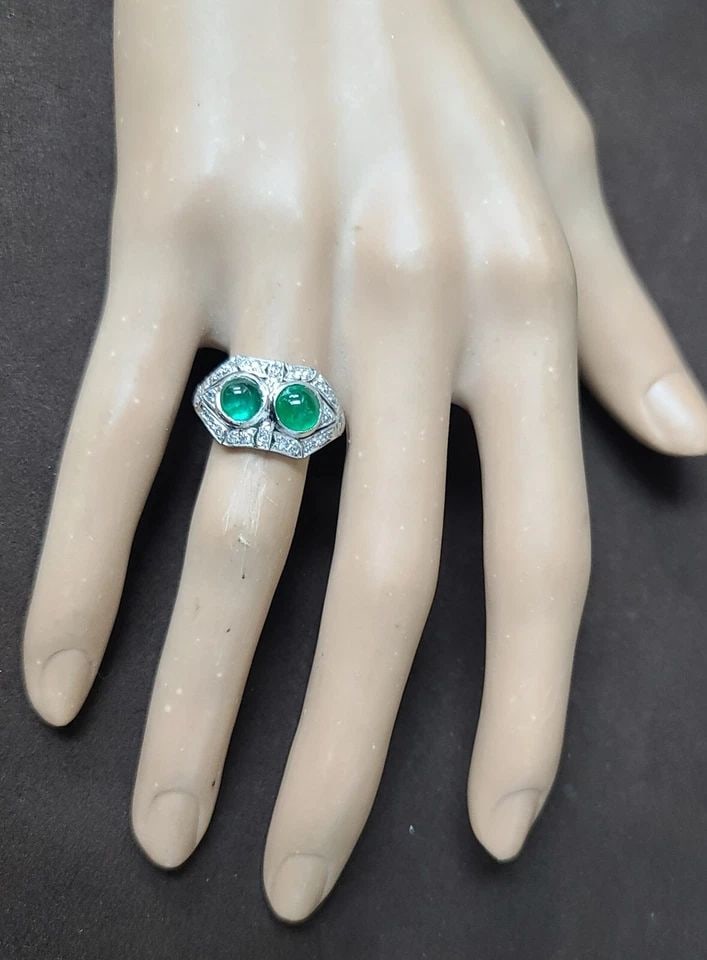 2.15CT. PLATINUM VINTAGE FILIGREE NATURAL EMERALD CABOCHON RING CIRC 1930'S: 2.15CT. PLATINUM VINTAGE FILIGREE NATURAL EMERALD CABOCHON RING CIRC 1930'S This stunning vintage ring boasts a beautiful natural emerald cabochon set in a platinum band with a pavé setting style. Th