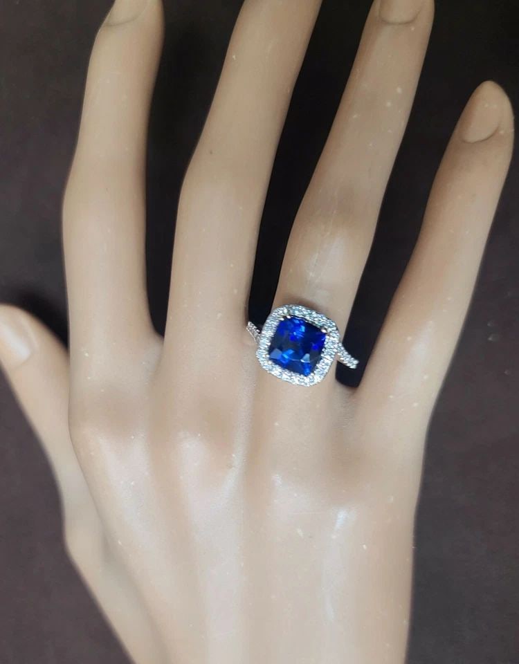 18K WHITE & YELLOW GOLD ENGAGEMENT RING 3.09CT. NATURAL BLUE SAPPHIRE CUSHION: 18K WHITE & YELLOW GOLD ENGAGEMENT RING 3.09CT. NATURAL BLUE SAPPHIRE CUSHION GORGEOUS 18k white & Yellow gold sapphire engagement ring center natural treated diffused blue sapphire cushion shape weig