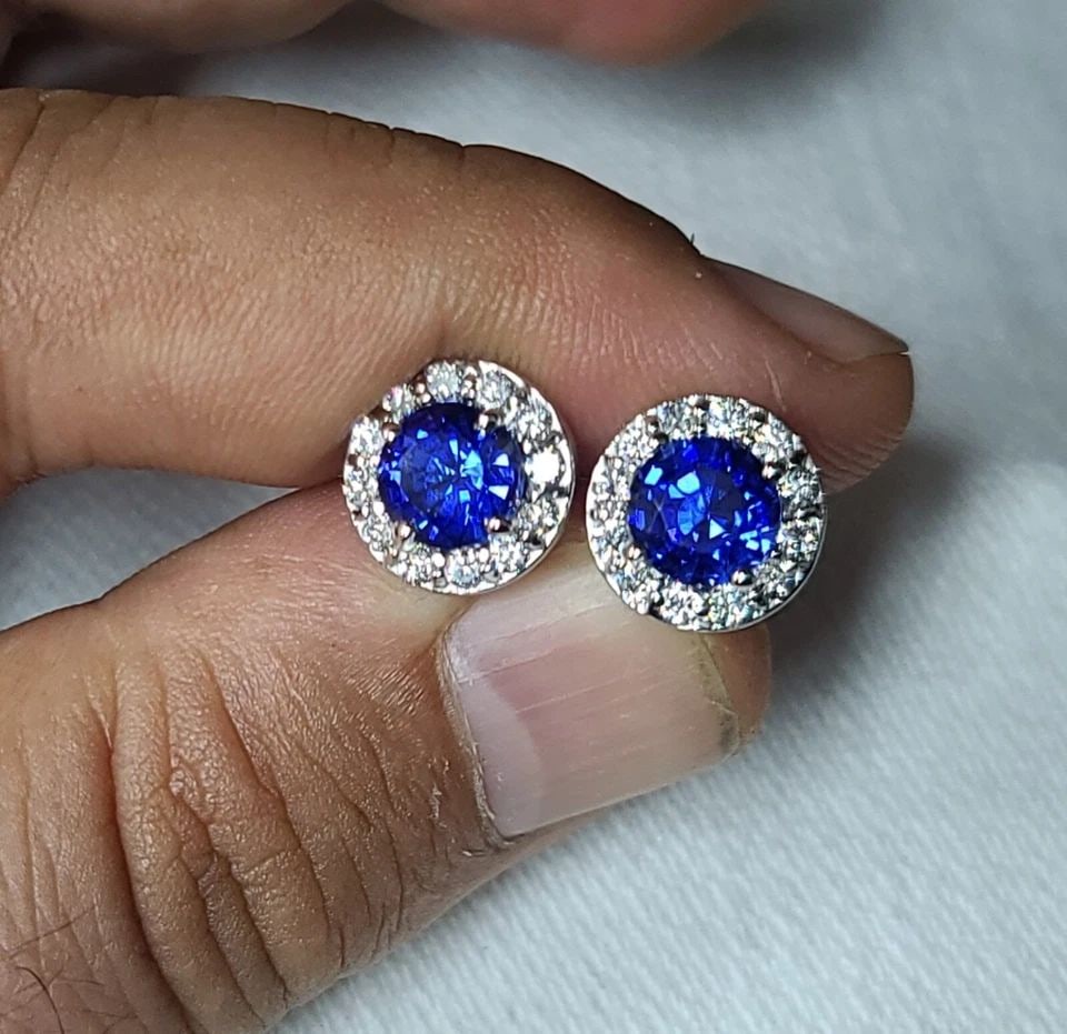 14K WHITE GOLD 4.02CT. GEM ROUND BLUE SAPPHIRE STUDS HOLLOW EARRINGS: 14K WHITE GOLD 4.02CT. GEM ROUND BLUE SAPPHIRE STUDS HOLLOW EARRINGS Gorgeous 14k white gold blue sapphire studs hollow earrings 4.02ct total weight natural diffused treated blue sapphire in round sha