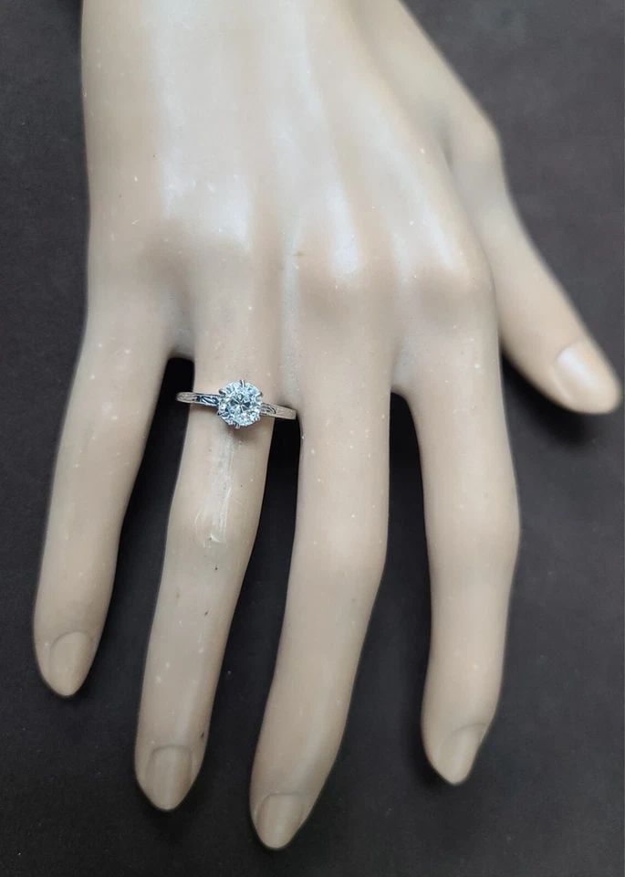 1.11CT. PLATINUM ART DECO FILIGREE ENGAGEMENT RING NATURAL OLD MINE CUT DIAMOND: 1.11CT. PLATINUM ART DECO FILIGREE ENGAGEMENT RING NATURAL OLD MINE CUT DIAMOND This stunning engagement ring features a natural Old Mine Cut Diamond set in platinum filigree. The solitaire style is a
