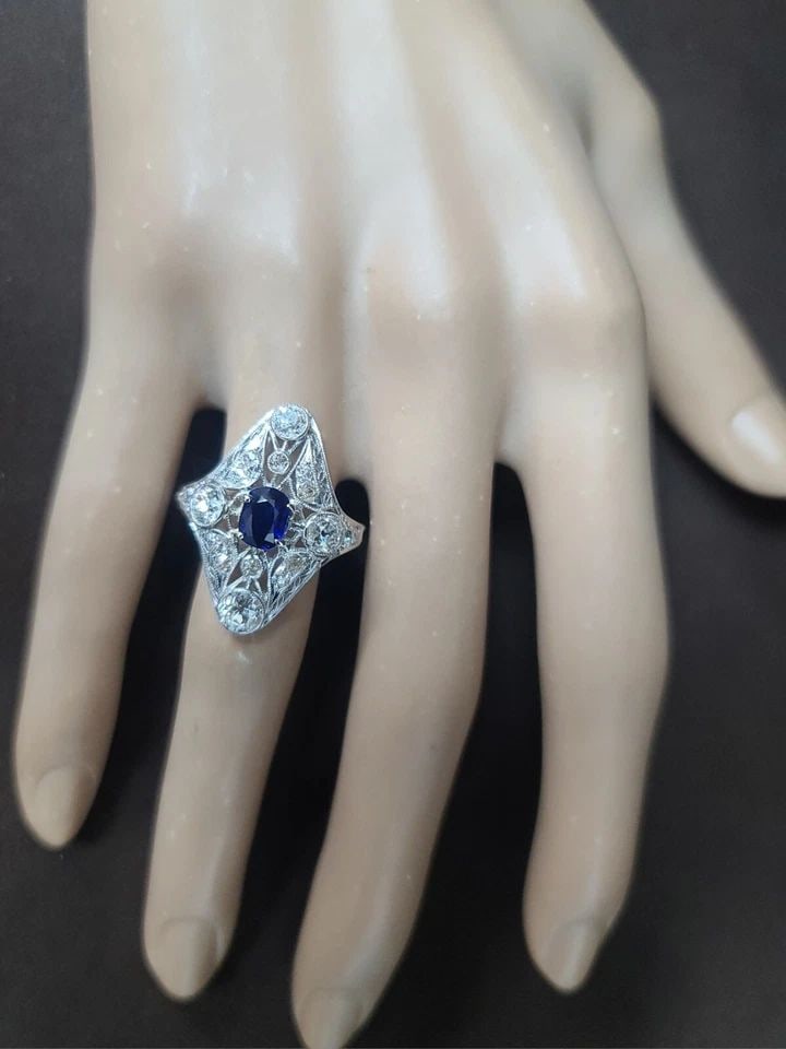 VINTAGE PLATINUM FILIGREE RING 1.59CT. NATURAL BLUE SAPPHIRE OVAL SHAPE: VINTAGE PLATINUM FILIGREE RING 1.59CT. NATURAL BLUE SAPPHIRE OVAL SHAPE Gorgeous Vintage art deco filigree Platinum ring blue sapphire in oval shape circ 1920s center natural sapphire weight 0.84ct. S