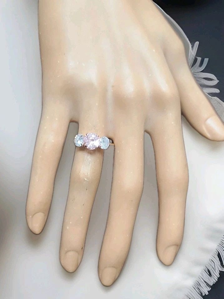 VINTAGE 14K ROSE GOLD ENGAGEMENT RING 2.18CT.NATURAL ROUND PADPARADCHA SAPPHIRE: VINTAGE 14K ROSE GOLD ENGAGEMENT RING 2.18CT.NATURAL ROUND PADPARADCHA SAPPHIRE This exquisite 14K rose gold ring showcases a 2.18-carat natural, size 7.1mm untreated padparadscha sapphire in a round 