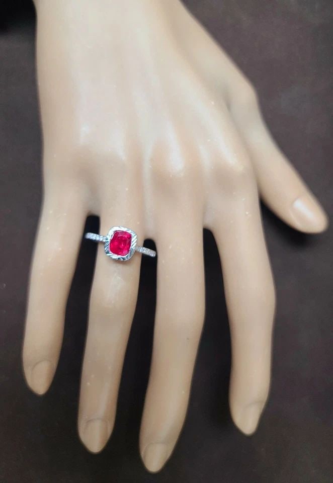 14K WHITE GOLD ENGAGEMENT RING 1.28CT. NATURAL UNHEATED RUBY CUSHION GIA CERT: 14K WHITE GOLD ENGAGEMENT RING 1.28CT. NATURAL UNHEATED RUBY CUSHION GIA CERT Gorgeous ring crafted in 14k white gold ring natural untreated cushion shape ruby weight 1.28ct. size 6.1x5.4x4.2 This rub