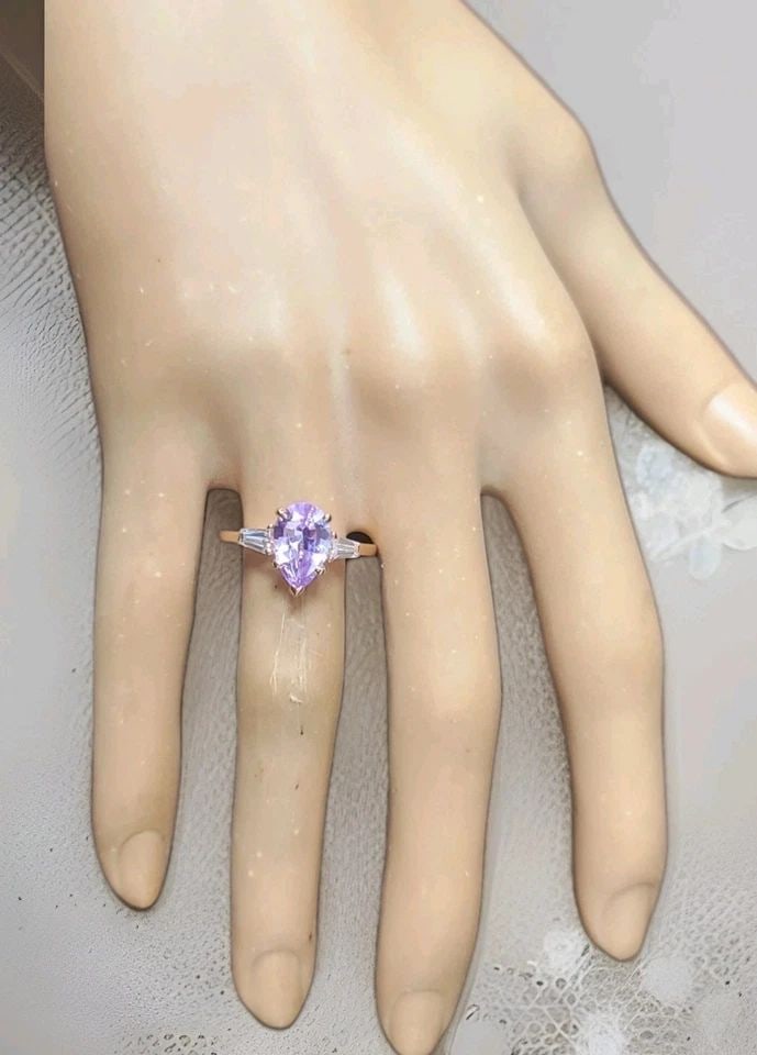 VINTAGE 14K ROSE GOLD ENGAGEMENT RING 2.09CT.NATURAL PINK SAPPHIRE PEAR CUT GIA: VINTAGE 14K ROSE GOLD ENGAGEMENT RING 2.09CT.NATURAL PINK SAPPHIRE PEAR CUT GIA This vintage 14k rose gold engagement ring features a beautiful 2.09CT natural pink sapphire in a pear cut, with two dia