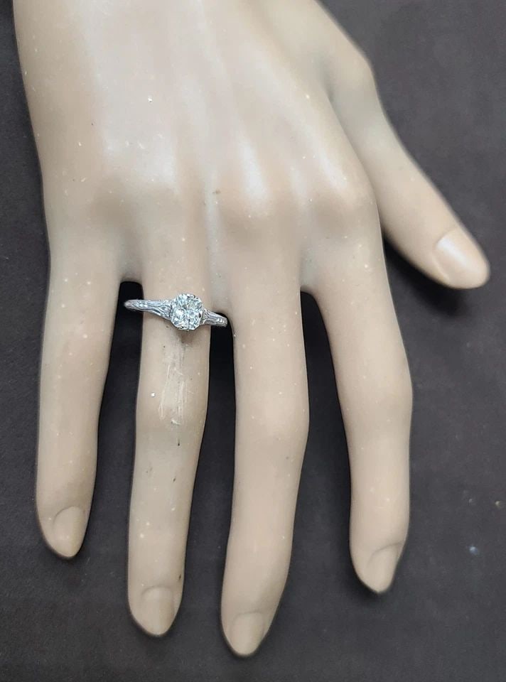 14K WHITE GOLD VINTAGE FILIGREE ENGAGEMENT RING 1.08CT. NATURAL RADIANT DIAMOND: 14K WHITE GOLD VINTAGE FILIGREE ENGAGEMENT RING 1.08CT. NATURAL RADIANT DIAMOND This 14k White Gold Vintage Filigree Engagement Ring features a beautiful 1.08CT natural radiant white diamond as the ma