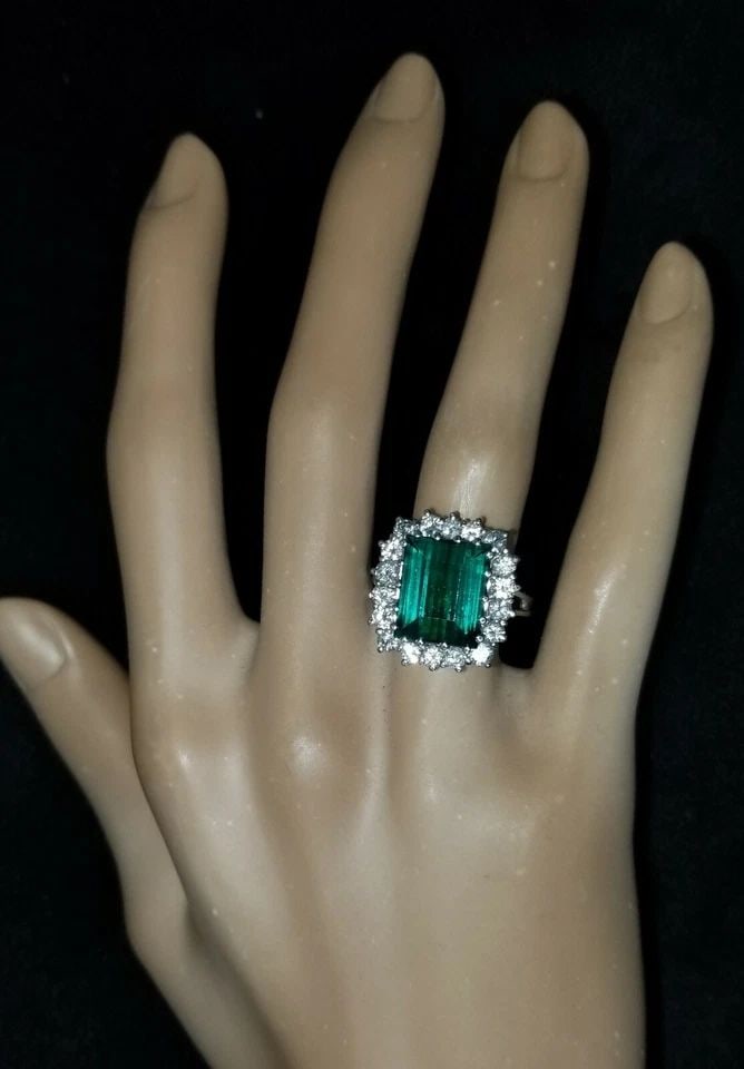 VINTAGE 14K WHITE GOLD RING 4.35CT. NATURAL GREEN TOURMALINE EMERALD SHAPE: VINTAGE 14K WHITE GOLD RING 4.35CT. NATURAL GREEN TOURMALINE EMERALD SHAPE GORGEOUS vintage 14K white gold ring natural green tourmaline in emerald shape center natural tourmaline weight 4.35ct. size 