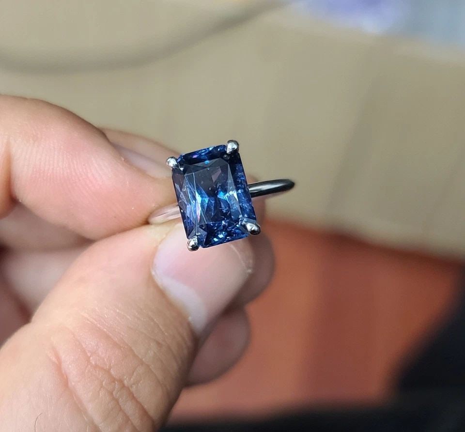 VINTAGE 14K WHITE GOLD ENGAGEMENT RING 6.73CT. NATURAL PURPLE SPINEL RADIANT: VINTAGE 14K WHITE GOLD ENGAGEMENT RING 6.73CT. NATURAL PURPLE SPINEL RADIANT This vintage engagement ring is a stunning piece of jewelry that will make any bride-to-be feel special. Crafted from 14k w
