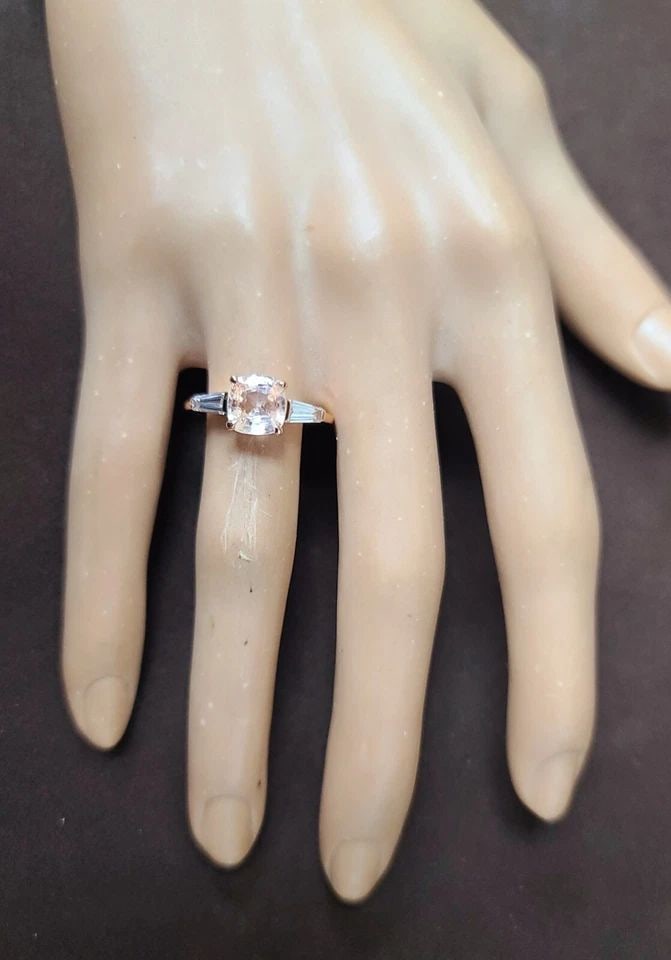 14K ROSE GOLD ENGAGEMENT RING 2.04CT. NATURAL PEACH SAPPHIRE CUSHION SHAPE GIA: 14K ROSE GOLD ENGAGEMENT RING 2.04CT. NATURAL PEACH SAPPHIRE CUSHION SHAPE GIA This stunning engagement ring is crafted from 14k rose gold and features a beautiful cushion-shaped natural peach sapphir