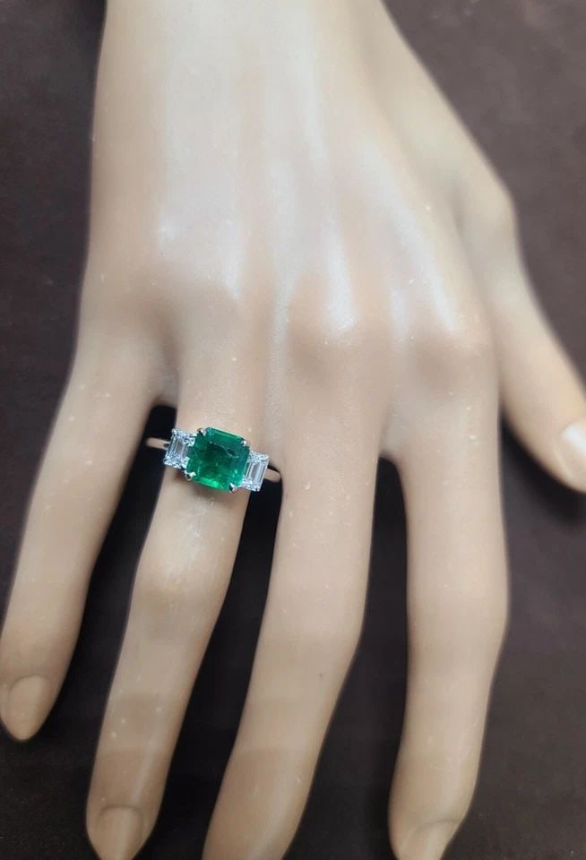 14K WHITE GOLD NATURAL EMERALD RING 1.73CT RADIANT CUT W/ 0.80CT DIAMOND ACCENTS: 14K WHITE GOLD ENGAGEMENT RING 1.73CT. NATURAL GREEN EMERALD RADIANT SHAPE GORGEOUS 14K WHITE GOLD gem natural emerald in radiant shape. center natural emerald weight 1.73ct. size 7.5x7.4mm very nice 