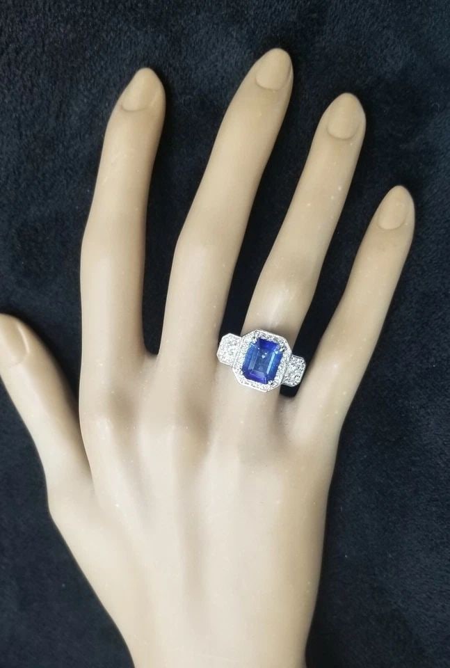 14K WHITE GOLD ENGAGEMENT RING 3.21CT NATURAL BLUE SAPPHIRE EMERALD CUT GIA CERT: 14K WHITE GOLD ENGAGEMENT RING 3.21CT. NATURAL BLUE SAPPHIRE EMERALD SHAPE GIA GORGEOUS 14K WHITE GOLD engagement ring natural blue sapphire in emerald shape center sapphire weight 3.21ct. size 9.5x7.