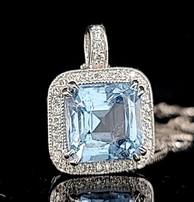 14K WHITE GOLD PENDANT 14.80CT. NATURAL SKY BLUE AQUAMARINE CUSHION SHAPE: 14K WHITE GOLD PENDANT 14.80CT. NATURAL SKY BLUE AQUAMARINE CUSHION SHAPE Gorgeous 14k white gold pendant natural blue aquamarine in radiant shape pendant 16 inch long. center natural aquamarine weigh