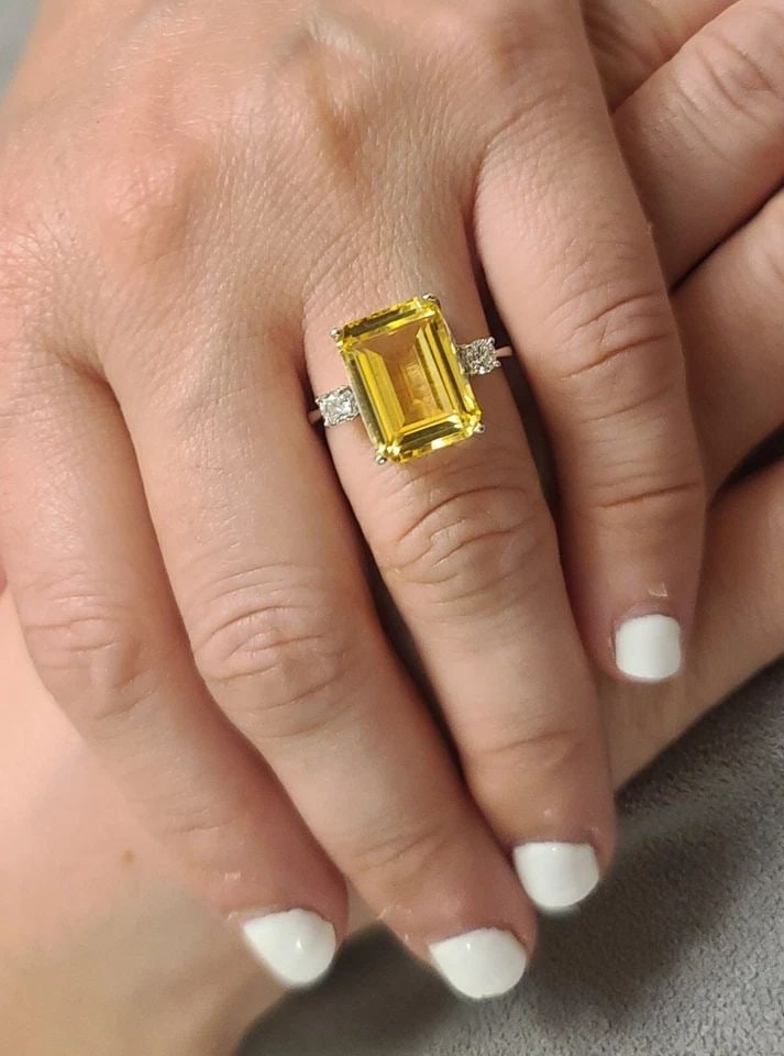 VINTAGE 14K WHITE GOLD ENGAGEMENT RING 9.39CT. LAB GROWN YELLOW SAPPHIRE: VINTAGE 14K WHITE GOLD ENGAGEMENT RING 9.39CT. YELLOW SAPPHIRE EMERALD SHAPE Gorgeous vintage 14k white gold engagement ring gem lab-grown yellow sapphire in an emerald shape Center set yellow sapphir