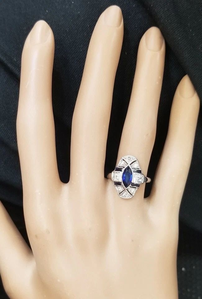 PLATINUM VINTAGE FILIGREE RING 1.65CT. NATURAL MARQUISE SAPPHIRE DIAMOND: PLATINUM VINTAGE FILIGREE RING 1.65CT. NATURAL MARQUISE SAPPHIRE DIAMOND Gorgeous Vintage marquise sapphire PLATINUM ring circa 1930 center marquise cut natural sapphire weight 0.85ct size 8mm x 3.5mm