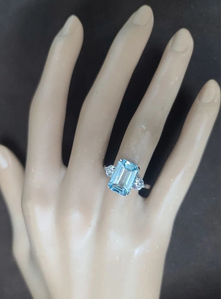 VINTAGE 14K WHITE GOLD 3.48CT NATURAL AQUAMARINE 0.75CT DIAMOND ENGAGEMENT RING: VINTAGE 14K WHITE GOLD ENGAGEMENT RING 3.48CT.NATURAL AQUAMARINE EMERALD CUT Gorgeous vintage 14k white gold engagement ring natural aquamarine emerald shape Center natural aquamarine in emerald shape