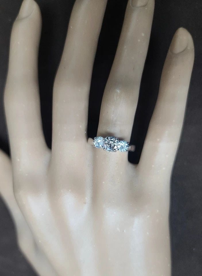PLATINUM ZALES THREE-STONE ENGAGEMENT RING 1.00CT. NATURAL DIAMOND: 1.00CT PLATINUM ZALES THREE STONE ENGAGEMENT RING NATURAL DIAMOND Here is an outstanding platinum diamond engagement ring designer by zales. The beautiful three stone diamond design gives this ring am