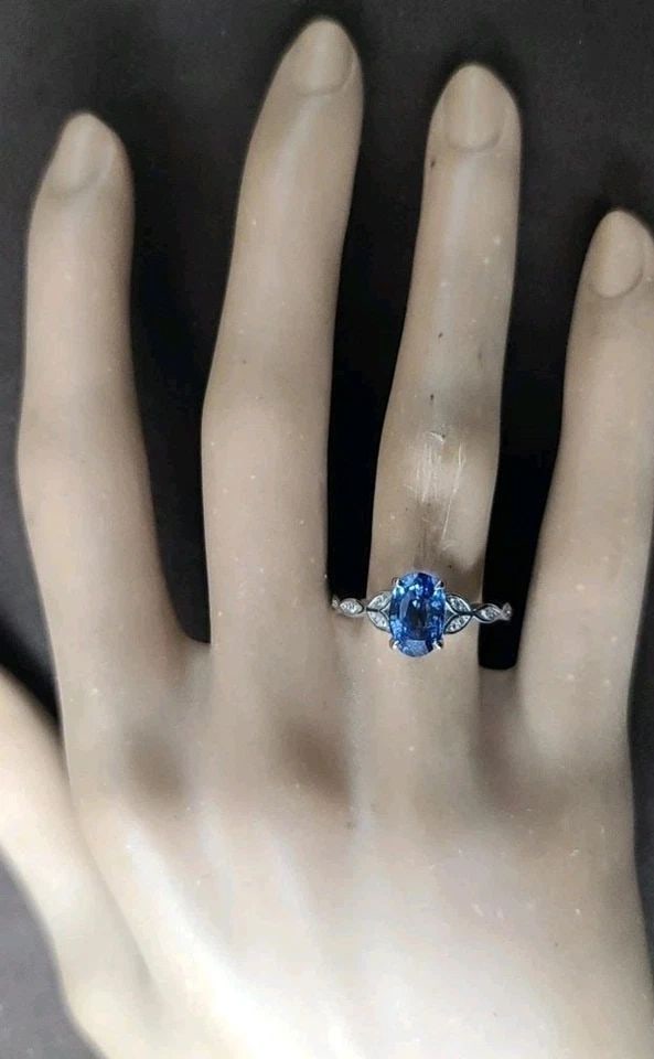 VINTAGE 14K WHITE GOLD ENGAGEMENT RING 2.21CT.NATURAL BLUE OVAL SAPPHIRE GIA: VINTAGE 14K WHITE GOLD ENGAGEMENT RING 2.21CT.NATURAL BLUE OVAL SAPPHIRE GIA Gorgeous 14k white gold engagement ring with natural blue Ceylon sapphire in oval shape, center weight 2.21carat. Very nice