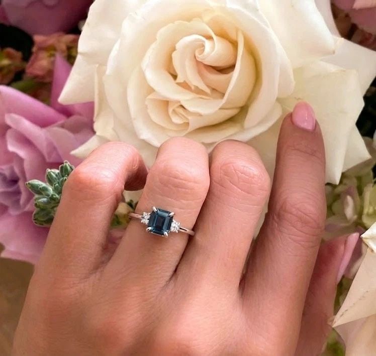 VINTAGE 14K WHITE GOLD ENGAGEMENT RING 2.04CT. NATURAL BLUE SPINEL RADIANT GIA: VINTAGE 14K WHITE GOLD ENGAGEMENT RING 2.04CT. NATURAL BLUE SPINEL RADIANT GIA This exquisite vintage 14K white gold engagement ring features a stunning natural, untreated teal blue spinel in a radian