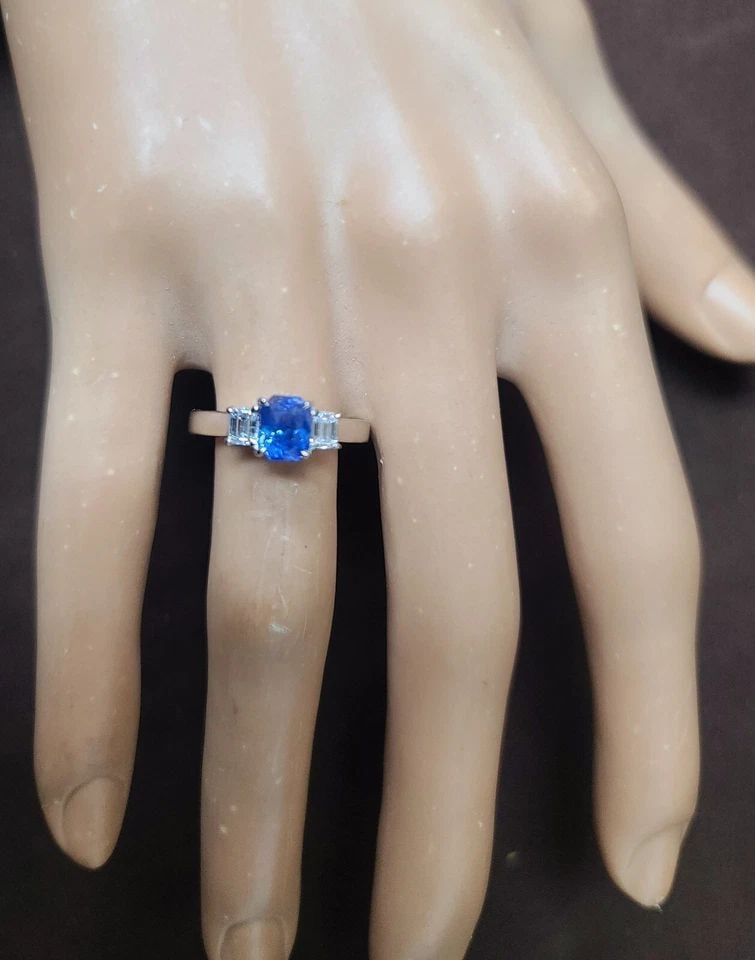 14K WHITE GOLD ENGAGEMENT RING 1.34CT. NATURAL UNTREATED BLUE SAPPHIRE RADIANT: 14K WHITE GOLD ENGAGEMENT RING 1.34CT. NATURAL UNTREATED BLUE SAPPHIRE RADIANT GORGEOUS 14K WHITE GOLD engagement ring natural blue Ceylon sapphire in radiant shape, center weight 1.34carat. size 6.2x