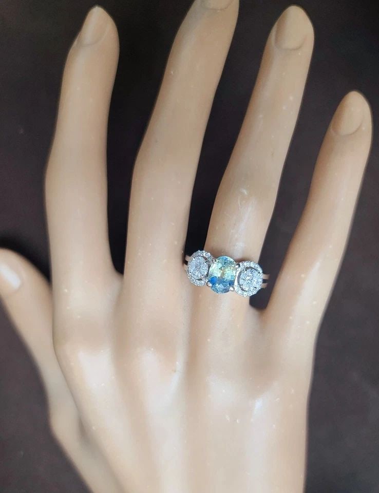 14K WHITE GOLD ENGAGEMENT RING 1.62CT. NATURAL BIO COLOR SAPPHIRE OVAL SHAPE: 14K WHITE GOLD ENGAGEMENT RING 1.62CT. NATURAL BIO COLOR SAPPHIRE OVAL SHAPE GORGEOUS 14K WHITE GOLD engagement ring with natural bio-color sapphire in an oval shape, the center natural sapphire yello