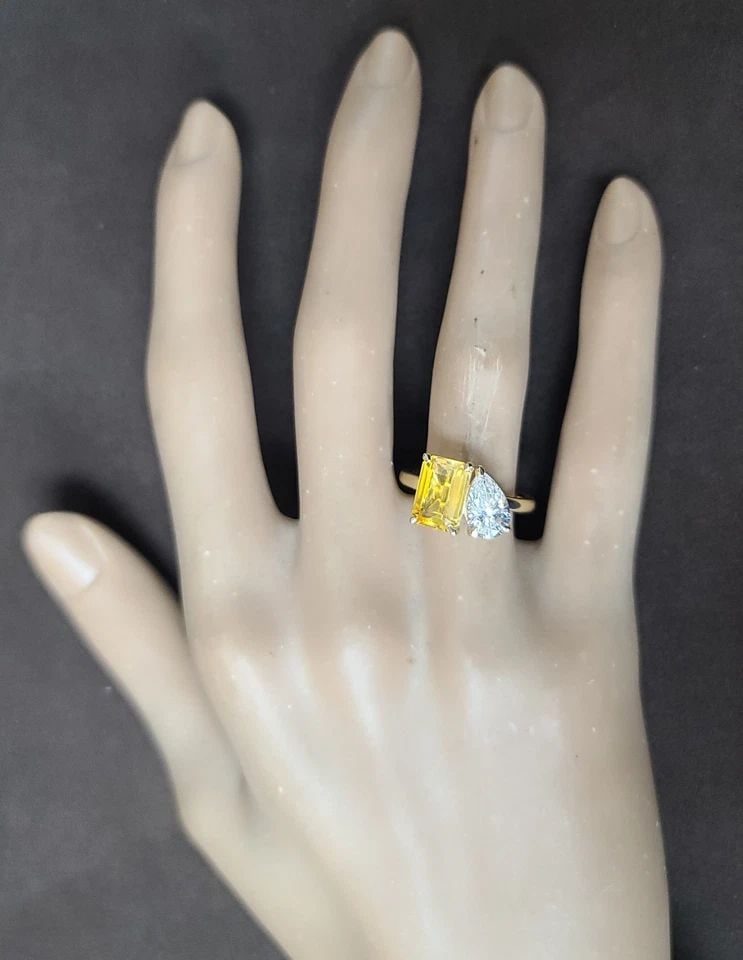 14K YELLOW GOLD 3.72CT. NATURAL YELLOW SAPPHIRE DIAMOND PEAR TOI ET MOI RING: This stunning 14k yellow gold ring is the perfect choice for any special occasion, whether it be an engagement, anniversary, or birthday. The ring features a beautiful 2.61 carat natural yellow sapphi