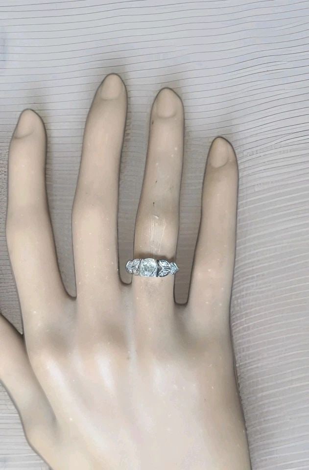 PLATINUM VINTAGE FILIGREE ENGAGEMENT RING 0.78CT. NATURAL OLD MINE CUT DIAMOND: PLATINUM VINTAGE FILIGREE ENGAGEMENT RING 0.78CT. NATURAL OLD MINE CUT DIAMOND This Platinum Vintage Filigree Engagement Ring features a 0.78ct. Natural Old Mine Cut Diamond, making it a timeless and 