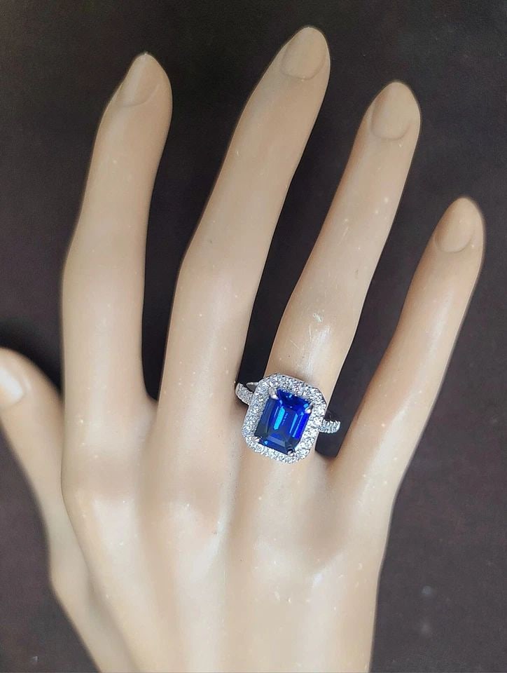 14K WHITE GOLD ENGAGEMENT RING 5.16CT.LAB GROWN BLUE SAPPHIRE EMERALD CUT: 14K WHITE GOLD ENGAGEMENT RING 5.16CT.GEM BLUE SAPPHIRE RECTANGULAR SHAPE Gorgeous 14K white gold blue sapphire engagement ring. center lab-grown blue sapphire in a rectangular shape. weight 5.16ct. s