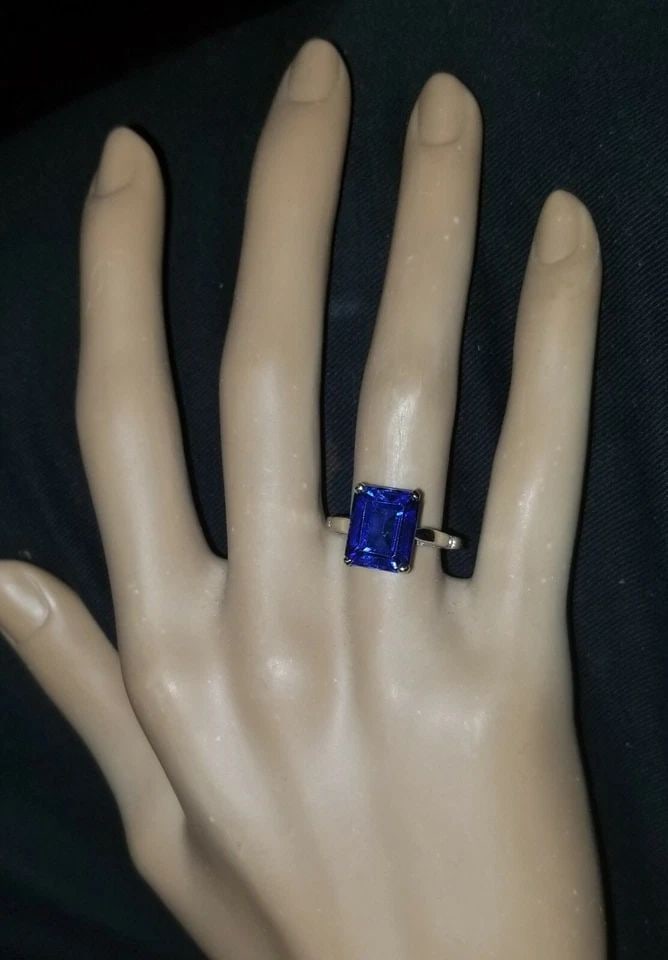 VINTAGE 14K WHITE GOLD ENGAGEMENT RING 6.70CT. LAB GROWN BLUE SAPPHIRE: VINTAGE 14K WHITE GOLD ENGAGEMENT RING 6.70CT. GEM BLUE SAPPHIRE EMERALD SHAPE GORGEOUS 14k white gold Vintage ring blue sapphire ring. center lab grown Sapphire in rectangular shape weight 6.70ct. si